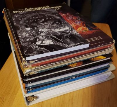 My younger son asked if he could buy some D&amp;D books off me as he wanted to start making his own adventures.
We haven't had a home game in years. I gave him duplicates of the main AD&amp;D books plus a copy of Delving Deeper.
The books are the ones I set aside last time he said he wanted to do this a few years ago. He's finally more settled at almost 23.
I'm interested to see what he comes up with.
He and his girlfriend have a table that can seat 8, and she's interested in trying D&amp;D.